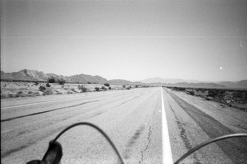 view of bicycle brake lever and cables on Route 66