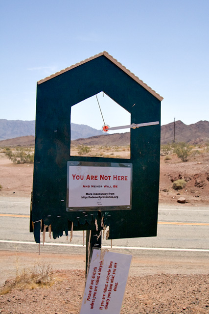 
you are not here kiosk fixed with wood glue and duct tape
